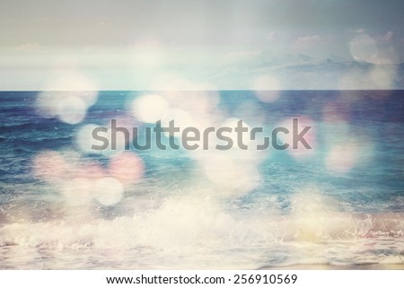 background of blurred beach and sea waves with bokeh lights, sandy beach  with turquoise water, bright white sun lights bokeh, travel and summer holidays concept, vintage effect