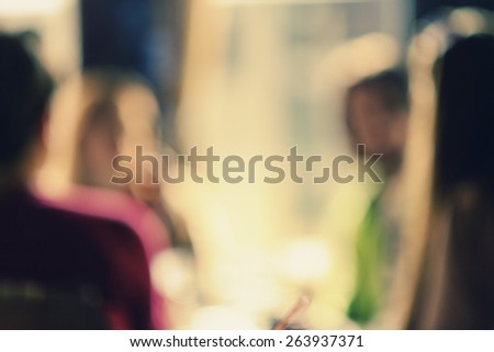 blurred group of people in cafe shop