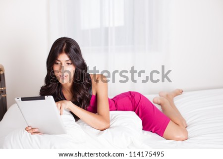 Beautiful Brunette curled up on the internet