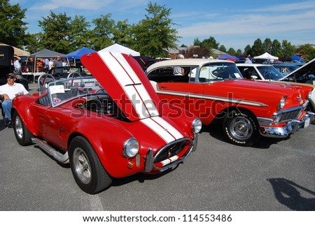 FREDERICK, MD- SEPTEMBER 16:1965 Red White Ford AC Cobra car on Sept. 16, 2012 in Frederick , MD USA. Alzheimer\'s Association Benefit Car Show at Motor Vehicle Administration in Maryland.