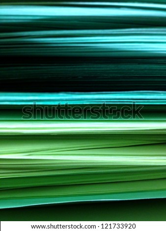 Green Blue Pile of Papers Background