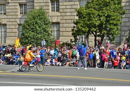 WASHINGTON, DC - APRIL 13: Cherry Blossom Parade on April 13, 2013 in Washington DC,USA.The parade is a spring celebration in Washington D.C.and people from all over the world come to watch the event.