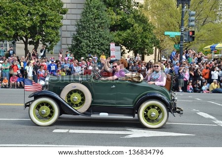 WASHINGTON, DC - APRIL 13: Cherry Blossom Parade on April 13, 2013 in Washington DC,USA.The parade is a spring celebration in Washington D.C.and people from all over the world come to watch the event