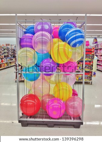 MARYLAND,USA - MAY 15: Assorted Ball Colors inside Basket at a Retail Store in Maryland, USA on May 15, 2013. Plastic toys have toxic materials, and it is a threat to children\'s health.