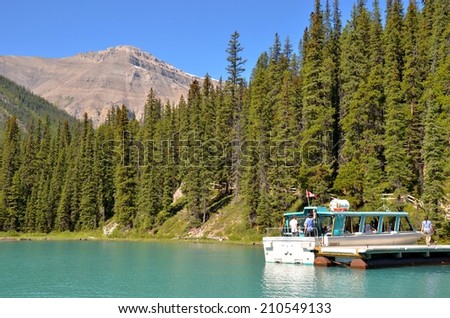 JASPER, ALBERTA - AUGUST 1 -  Boat Tours at Maligne Lake in Jasper, Canada on August 01, 2014. Maligne Lake is visited by millions of people every year, and do the boat tour to Spirit Island.