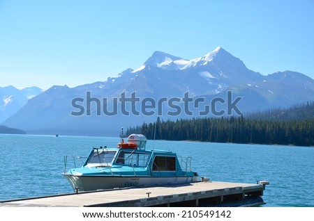 JASPER, ALBERTA - AUGUST 1 -  Boat Tours at Maligne Lake in Jasper, Canada on August 01, 2014. Maligne Lake is visited by millions of people every year, and do the boat tour to Spirit Island.