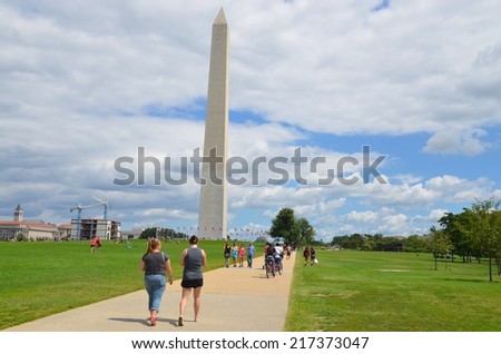 WASHINGTON, DC - AUGUST 17: Washington DC Monument and Capitol on August 17, 2014 in Washington DC,USA. Famous Washington DC Monument in Washington, D.C, people from all over the world come to visit.