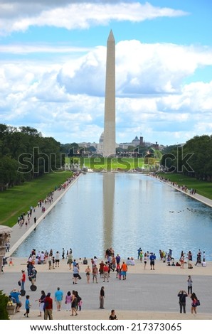 WASHINGTON, DC - AUGUST 17: Washington DC Monument and Capitol on August 17, 2014 in Washington DC,USA. Famous Washington DC Monument in Washington, D.C, people from all over the world come to visit.