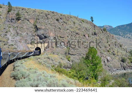 CANADIAN ROCKIES, ALBERTA - AUGUST 1 - Rocky Mountaineer train ride in Alberta, Canada on August 01, 2014. The most famous Rocky Mountaineer train ride on the Canadian Rockies.