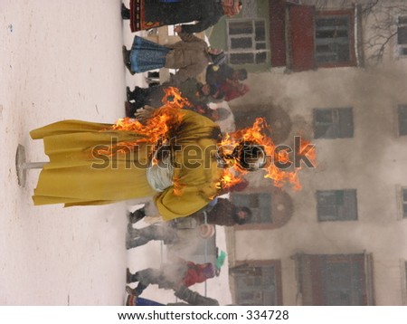 The Russian traditional holiday Shrovetide. Burning the effigy. The Round dance with singing.
