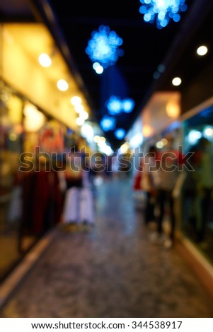 blur light background shot from outdoor shopping mall/outdoor shopping mall night scene/blur light of shopping mall for background