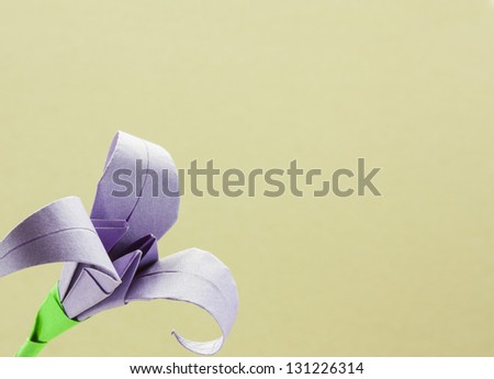 background with paper folded iris flower