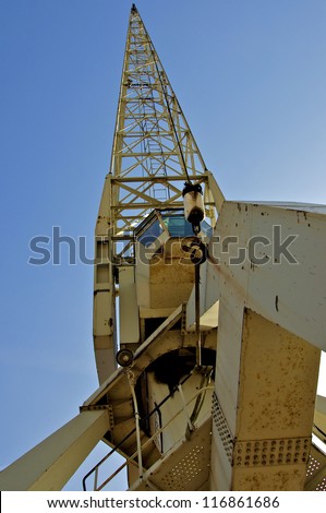 Harbor crane from worm\'s-eye view in the port of Hamburg