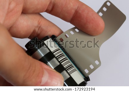 Holding a Photographic film