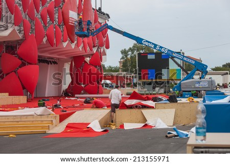 25 August 2014 gluing stickers on the decoration of the cinema theater on the 71 film festival in Venice