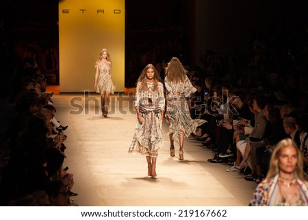 MILAN, ITALY - SEPTEMBER 19: models walk the runway during the Etro Ready to Wear show as a part of Milan Fashion Week Womenswear Spring/Summer 2015 on September 19, 2014 in Milan, Italy