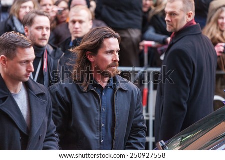 Berlin, Germany - FEBRUARY 08: Cristian Bale making autographs before the press conference of the film \