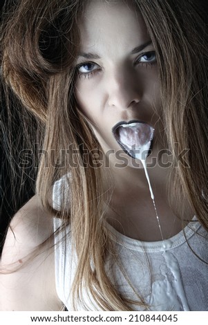 mysterious girl who is leaking milk from the lips