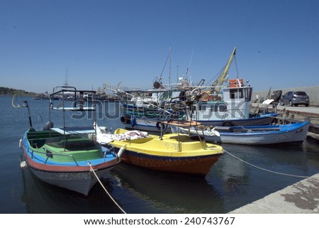 Nessebar, Bulgaria, June,10,2012. Colourful fishing boats at the pier on tour city Nesebar in Bulgaria