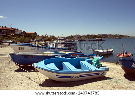 Nessebar, Bulgaria, June,10,2012. Colourful fishing boats at the pier on tour city Nesebar in Bulgaria