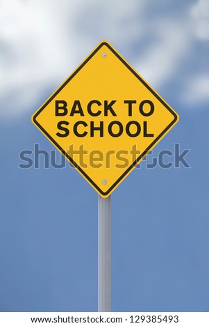 A Back To School road sign against a blue sky background