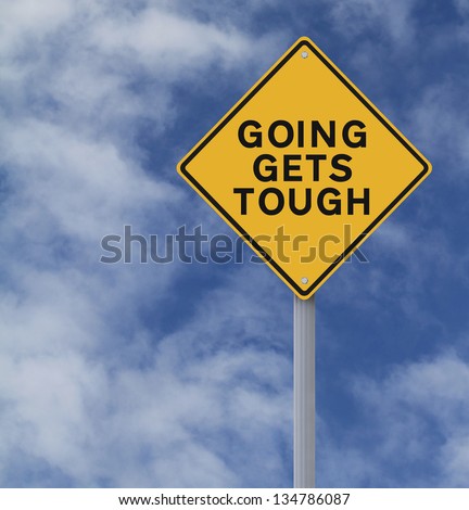 Conceptual road sign warning of tough times ahead