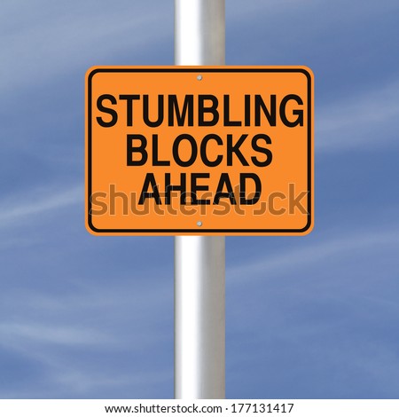 A road sign warning of stumbling blocks ahead