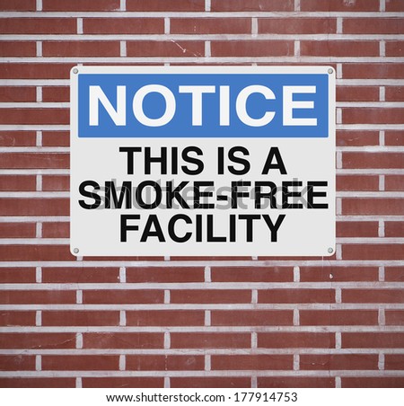 A notice sign announcing a smoke-free workplace