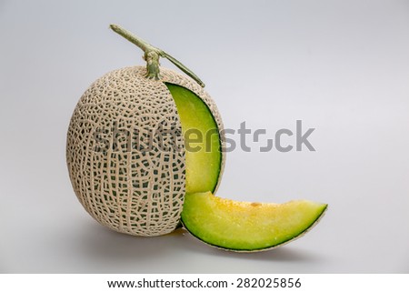 Honeydew Melon/A Juicy melon/A juicy honeydew melon from Japan on a white background.