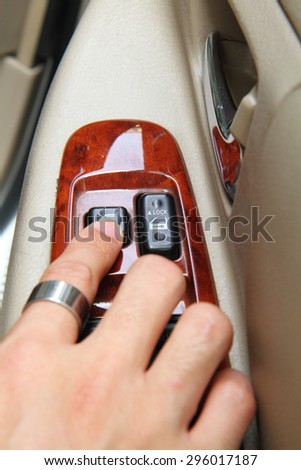 press to locked the mirror of car / focus at locked the mirror button