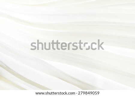 White fabric background pleated. White pleated skirt.
