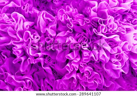 Purple fabric flounces background