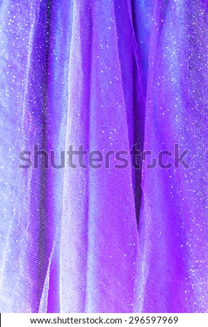 Background from lilac delicate fabric with sequin
