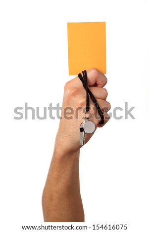 Human Hand with whistle yellow card Isolated on white background Human Hand with whistle yellow card Isolated on white background