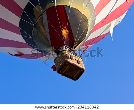 Hot-air balloon flying, unusual perspective view from bottom, detail