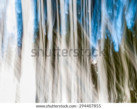abstract artistic vertical motion blurred shapes, vertical lines