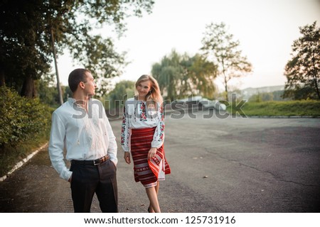 Portrait of a young romantic couple in Ukraine national clothing