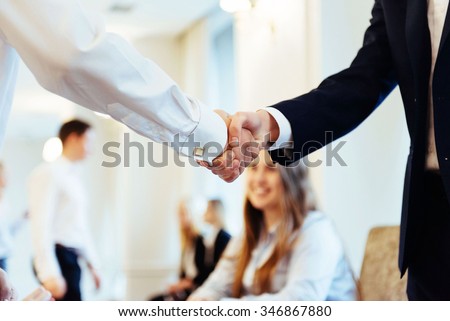 Business men hand shake