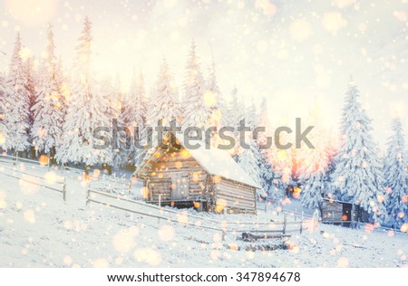 cabin in the mountains in winter,  background with some soft highlights and snow flakes