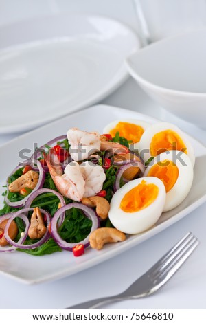 fern salad with boiled egg, traditional and modern thai food