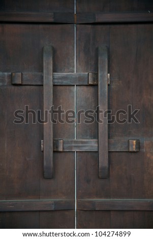 The latch of the ancient Chinese door made by wood