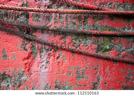 red wall with rope/painting wall
