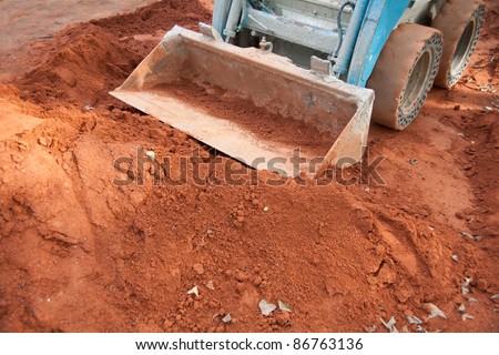 Operation of bulldozers and the accumulation of clay