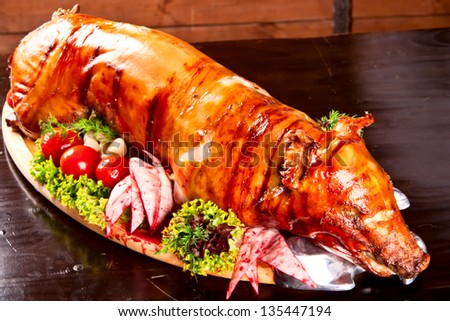 Roast pig on a platter