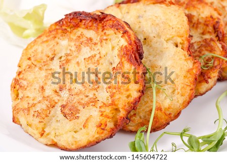 Potato pancakes with sour cream