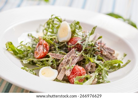 Salad with beef tongue and arugula