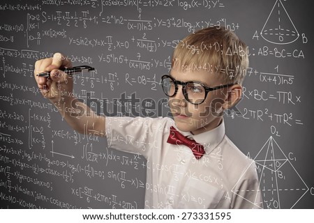 boy solves a math problem