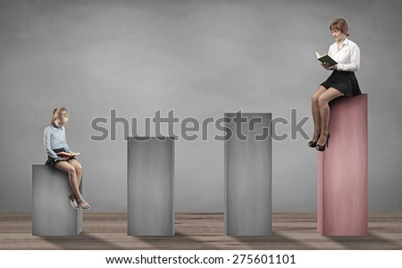 woman and little girl reading a book