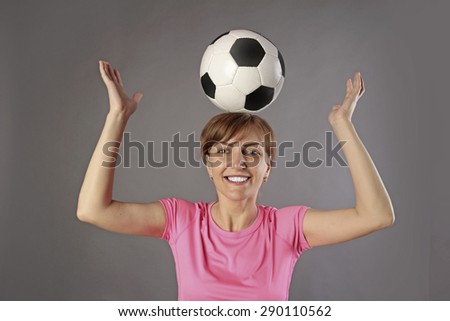 woman football player with ball