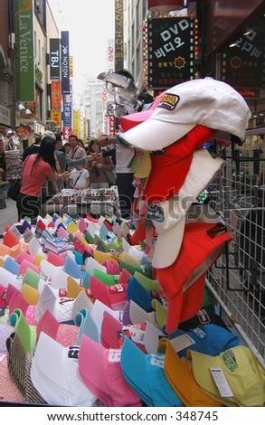 Hat's off! in a weekend market in central Seoul, Korea.